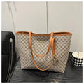 PU leather street trend shoulder bag with sewing thread detail in a choice of colours.