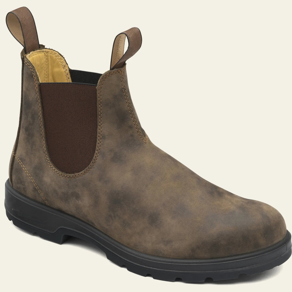 Unisex vintage brown Chelsea boots with a chunky sole and round toe on a white background