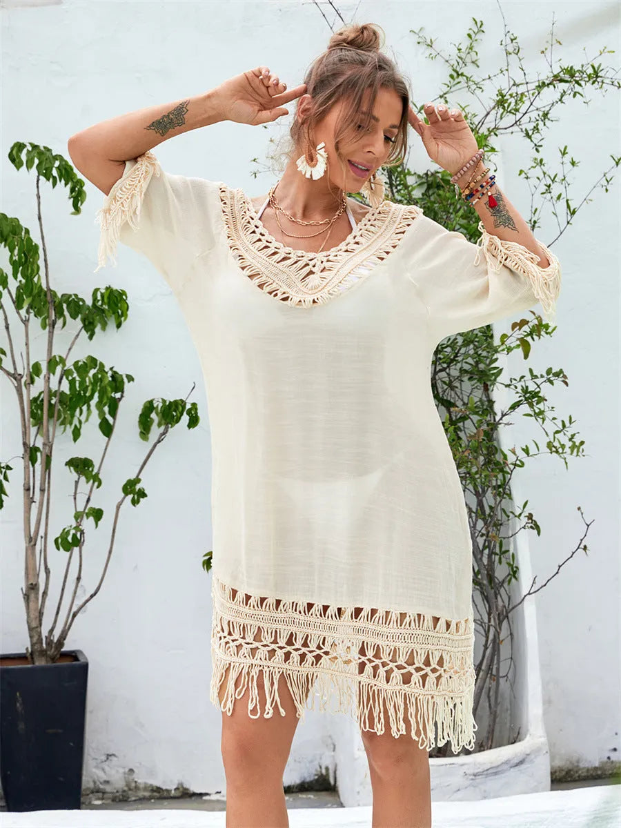 Apricot hand-crocheted women's beach dress with polyester lining shown as beach cover-up