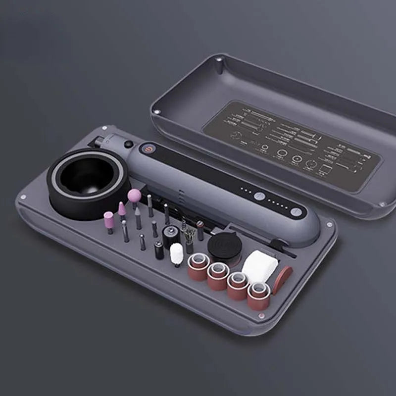 Compact cordless mini electric polishing and cutting machine set on a workbench