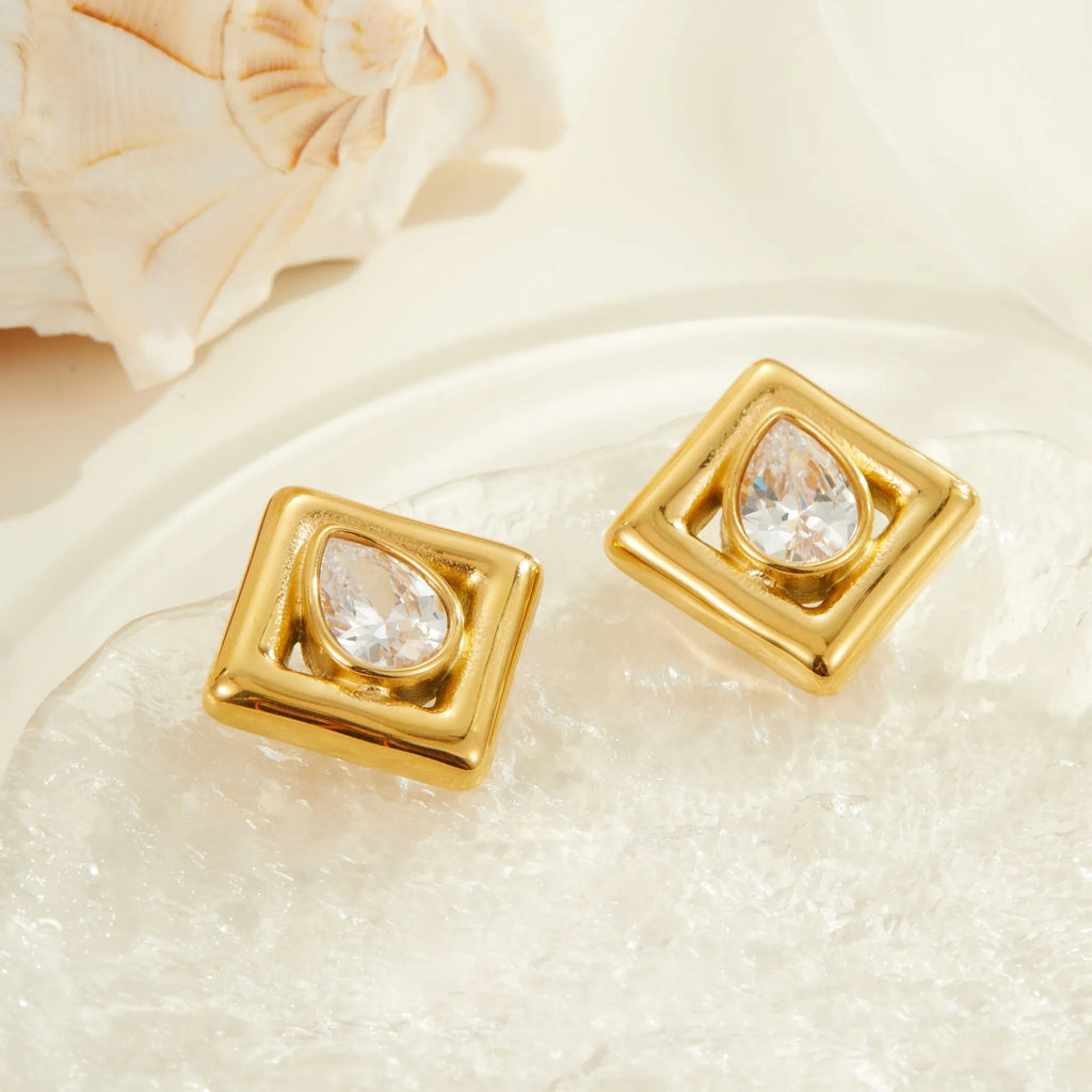 Gold stud earrings with geometric water drop zircon design on stainless steel
