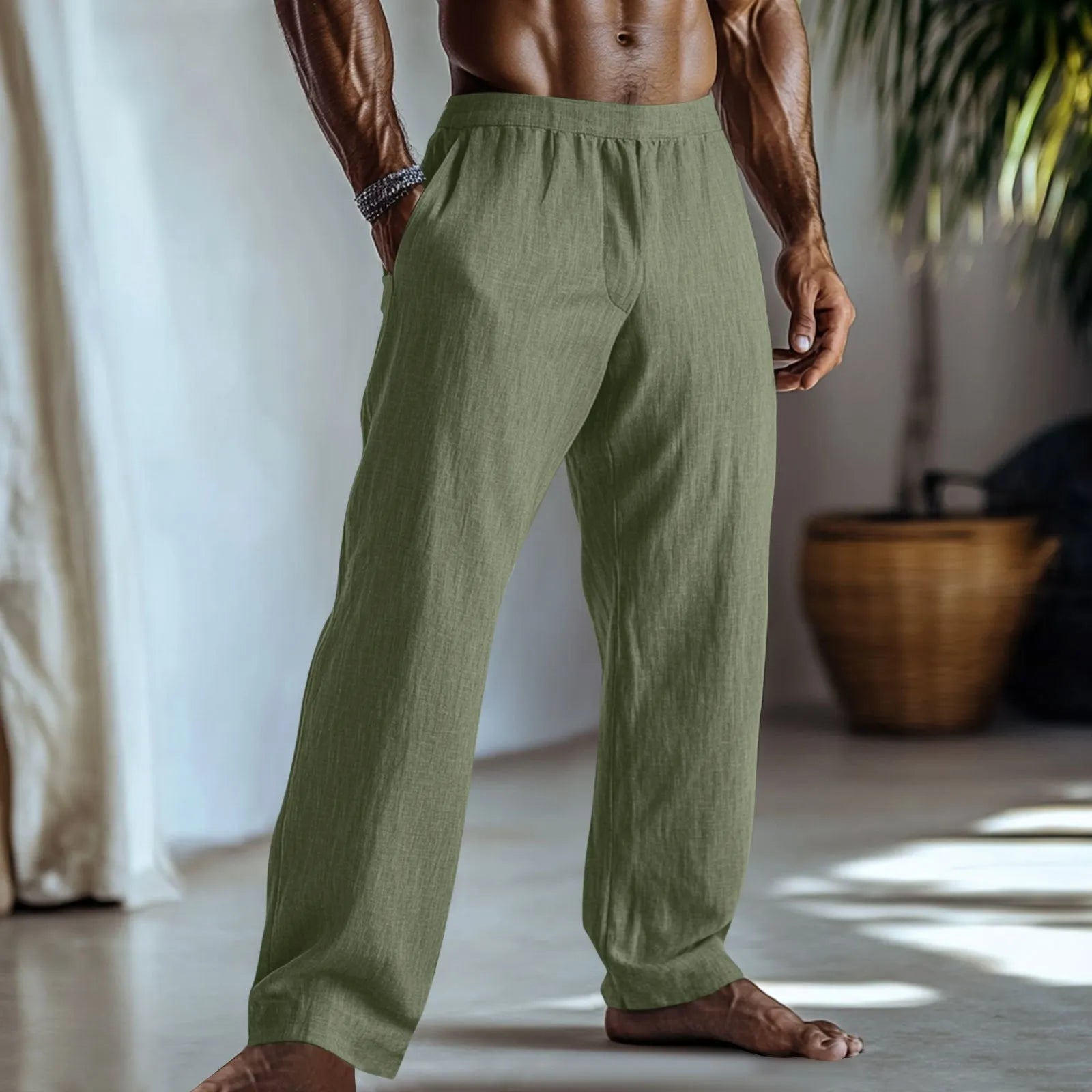 Straight-leg cotton linen trousers in light green shown front and back view
