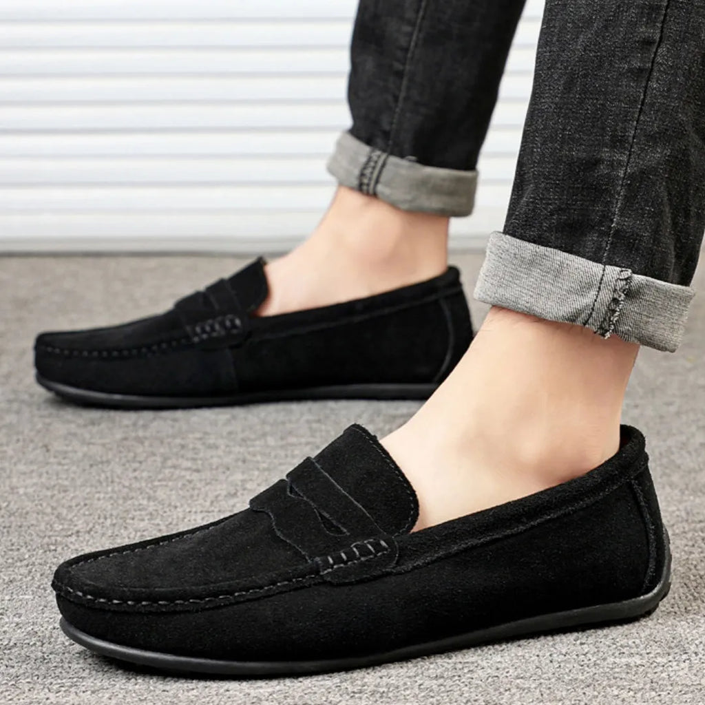 Men's suede leather slip-on loafers in various colours with a flat rubber sole and round toe
