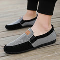 Men's grey and khaki canvas casual shoes with a round toe and rubber sole.