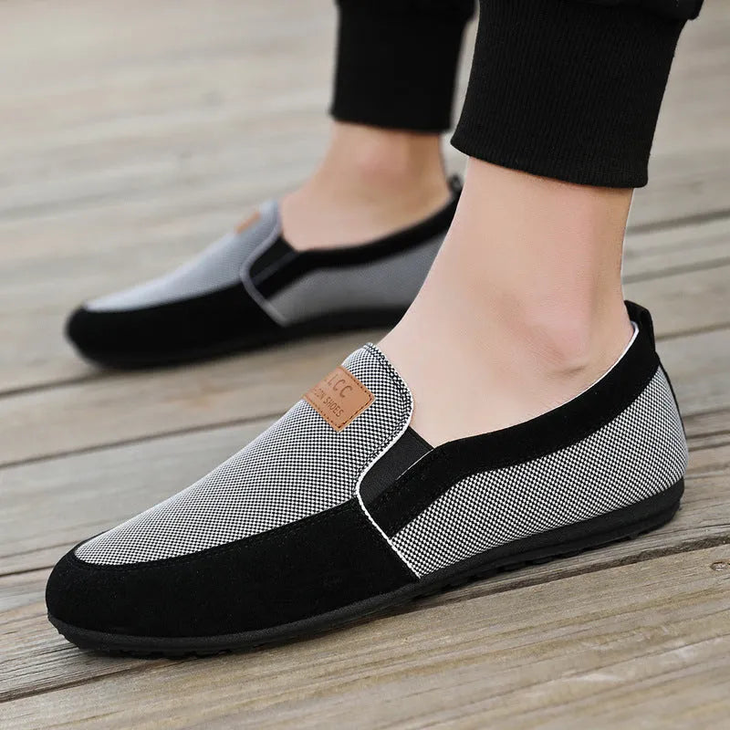 Men's grey and khaki canvas casual shoes with a round toe and rubber sole.