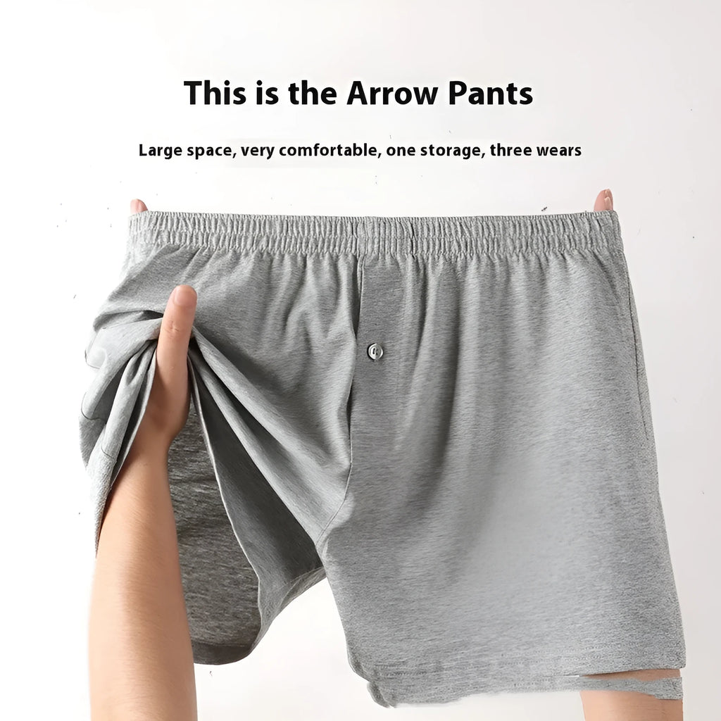 Men's solid colour loose-fit cotton boxer shorts on a white background, showing high waist and leg openings.