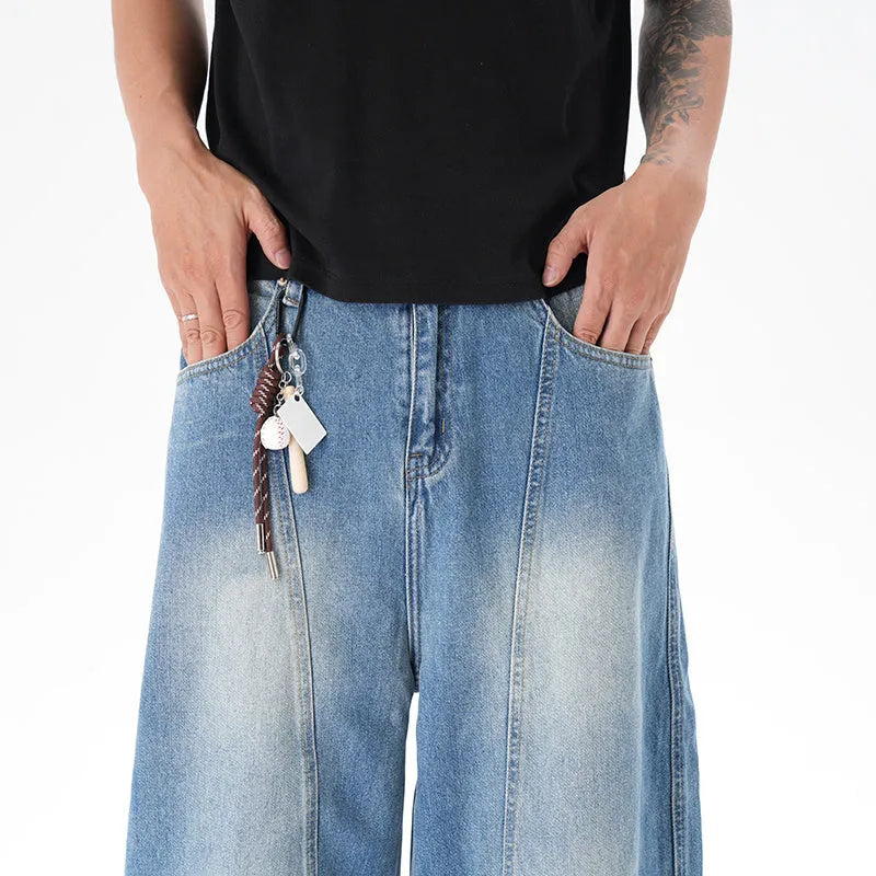 Light blue vintage washed wide leg jeans with zipper closure on mannequin