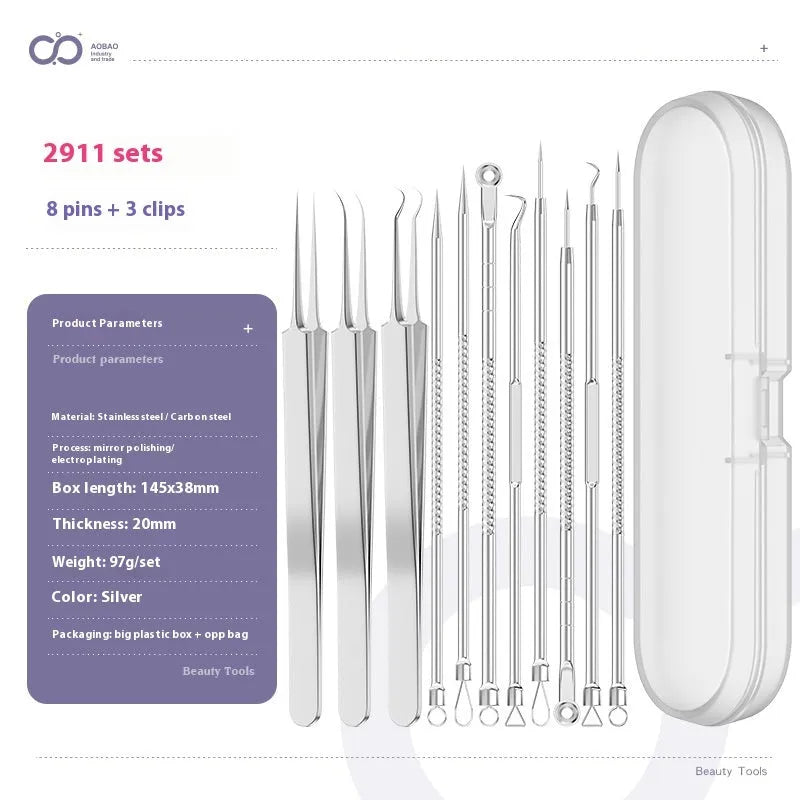 Four silver metal acne needles with pointed tips laid out on a flat surface.