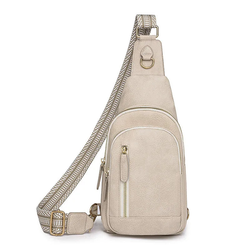 Women's soft PU leather crossbody bag in street trend style with open pocket and internal compartments