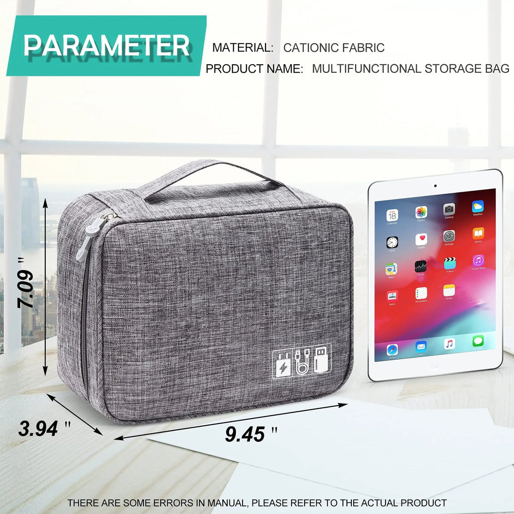Black waterproof travel cable organiser bag open to show removable dividers and mesh pockets for electronics.
