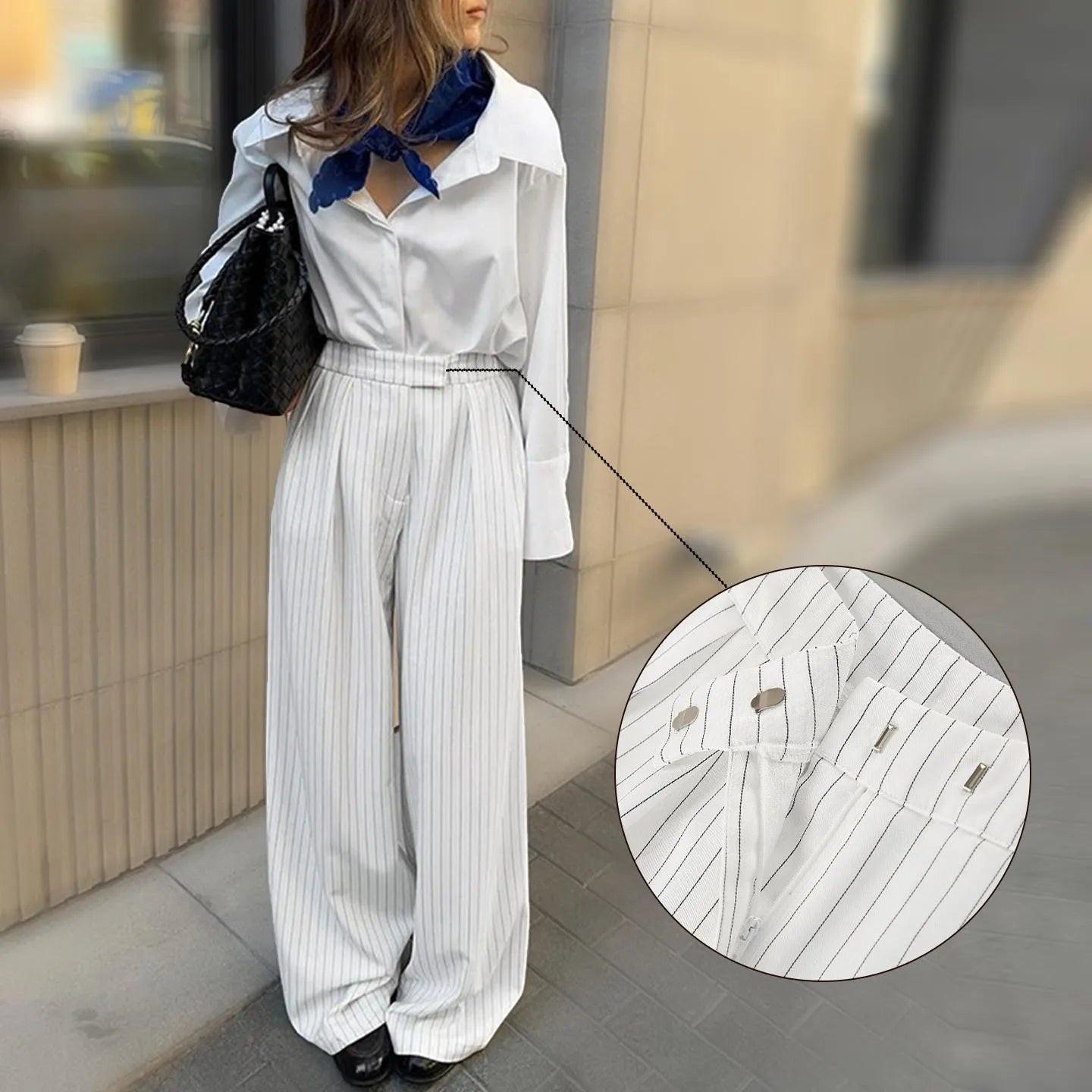 White striped wide-leg women's trousers with front zipper in loose casual fit
