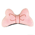 Plush bow tie helmet decoration for motorcycle and ski helmets in red, peach pink, and rose pink colours.