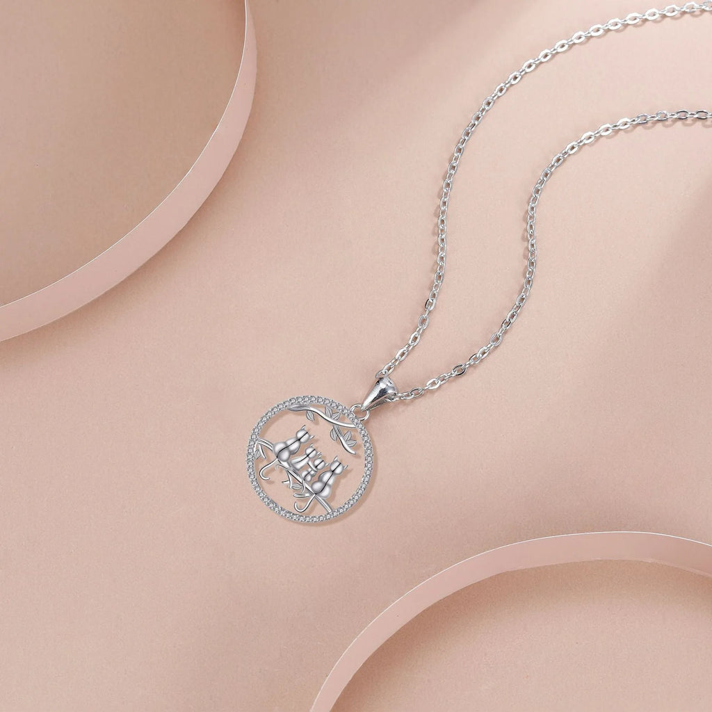 Copper necklace with four kitten pendant on cross chain for women
