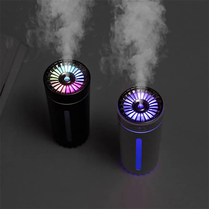 Black portable USB rechargeable humidifier with colourful LED lights and compact design for car or desktop use