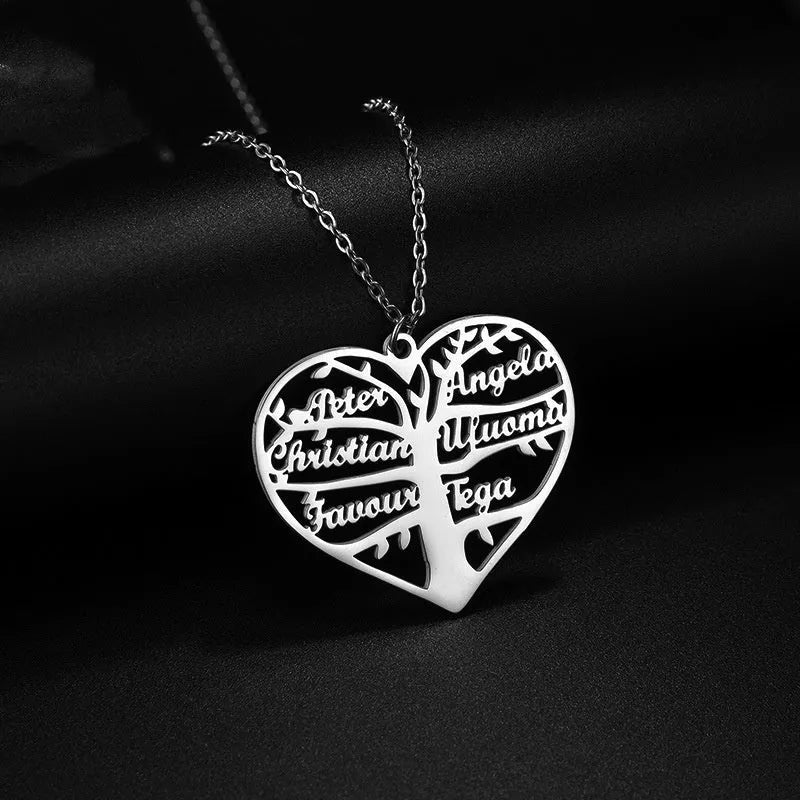 Custom silver necklace with hollow heart and life tree pendant engraved with names on a 50cm chain.