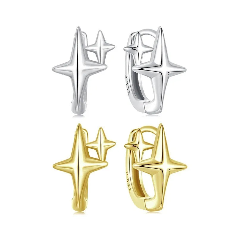 Minimalist sterling silver star clip earrings with oxidation treatment and XINGX celestial elements