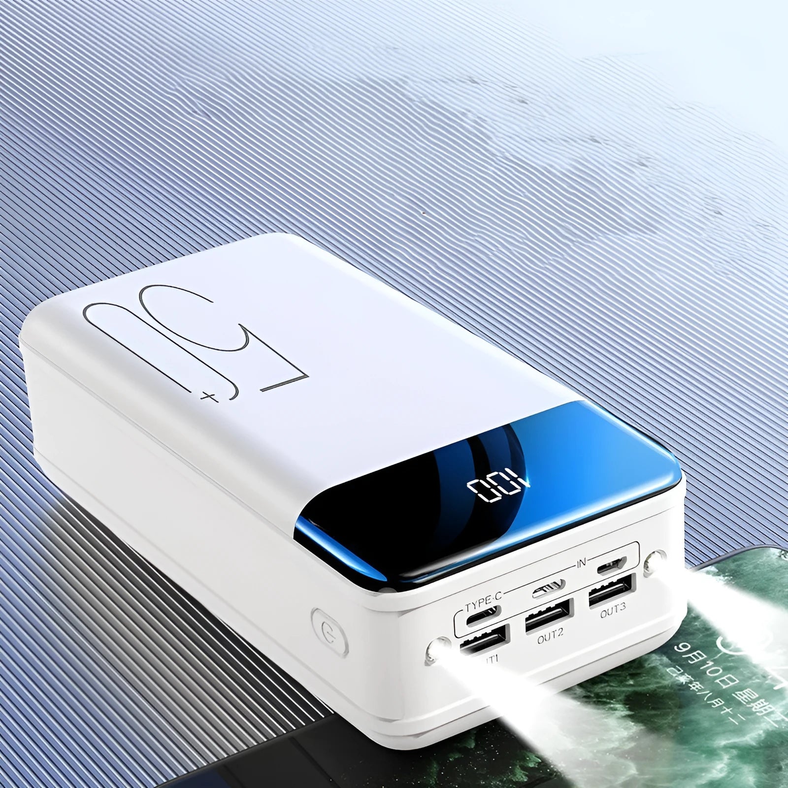 Large black or white 50000mAh power bank with three charging ports showing dimensions 169x83x52mm