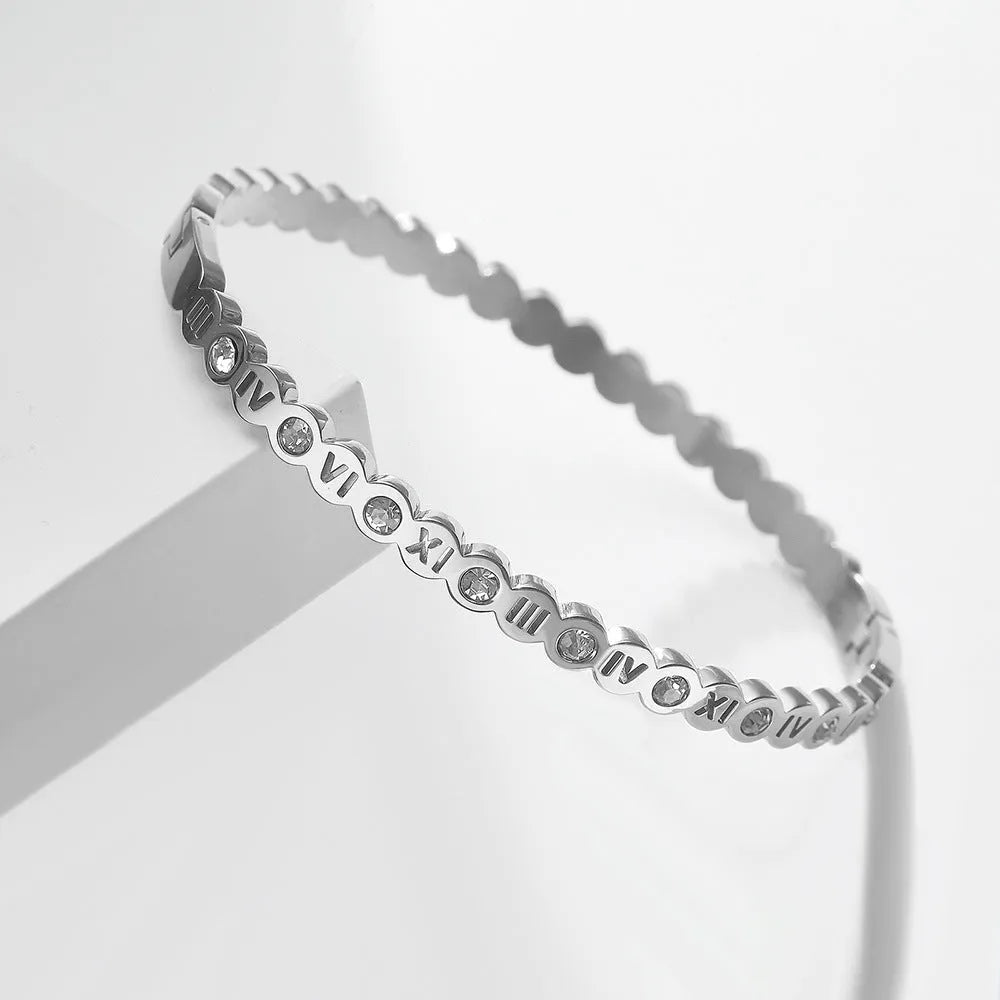 Korean style titanium steel bracelet with number design in gold, rose gold, or steel colour.