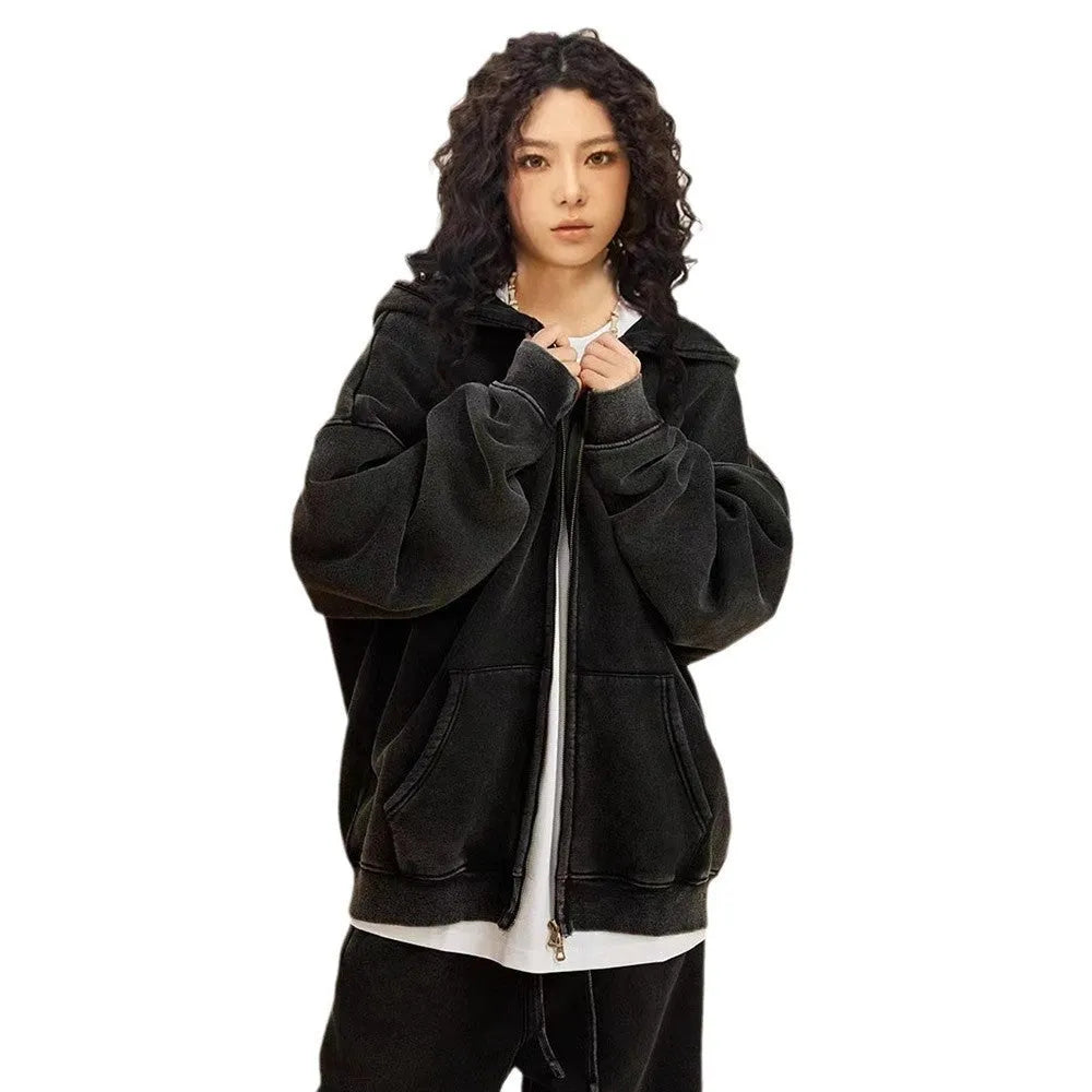 Man's dark green fleece-lined hooded cardigan sweater with a double zip front.