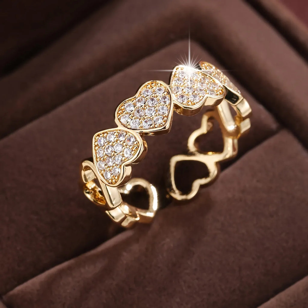 Geometric love heart couples ring with adjustable opening in gold and silver colours