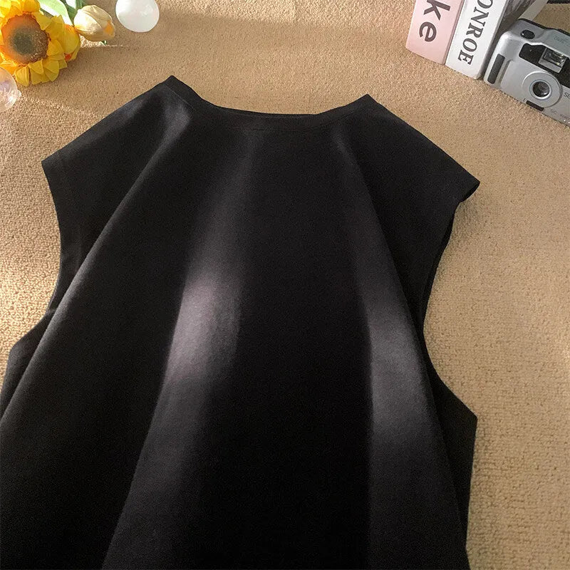 Men's loose cotton tank top in solid colours showing sleeveless design and straight hem