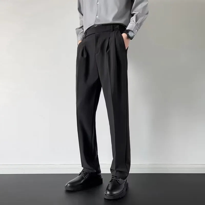 Men's apricot and black straight loose fit suit pants made from polyester fibre.