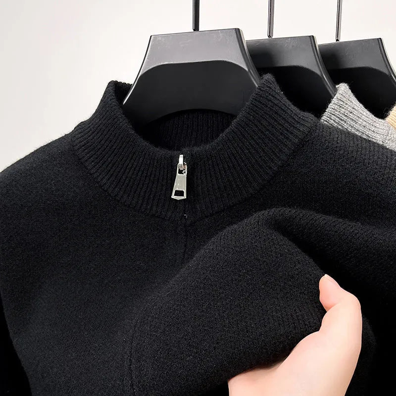 Men's loose grey knitted cardigan with a stand collar and a front zipper.