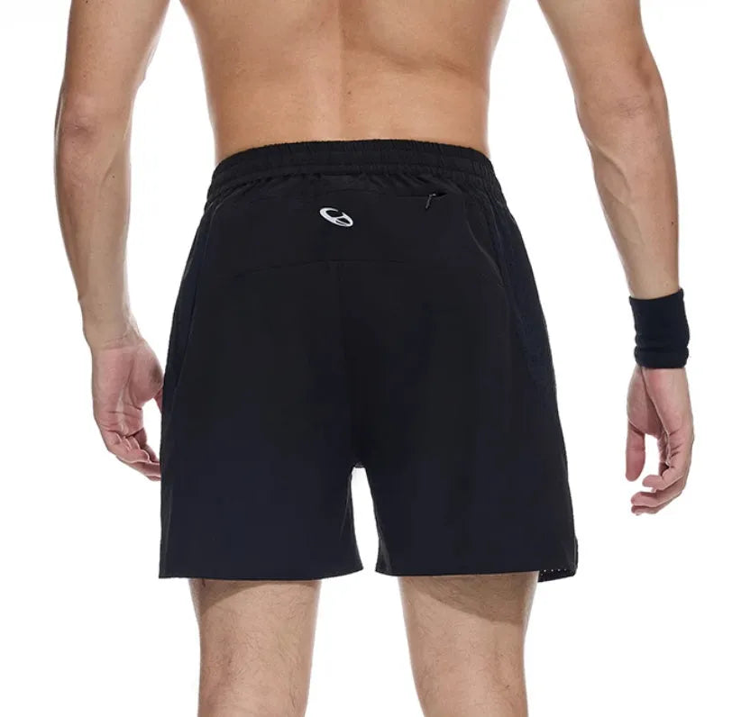 Black and blue four-point stretch running shorts with laser-cut stitching detail on a mannequin.