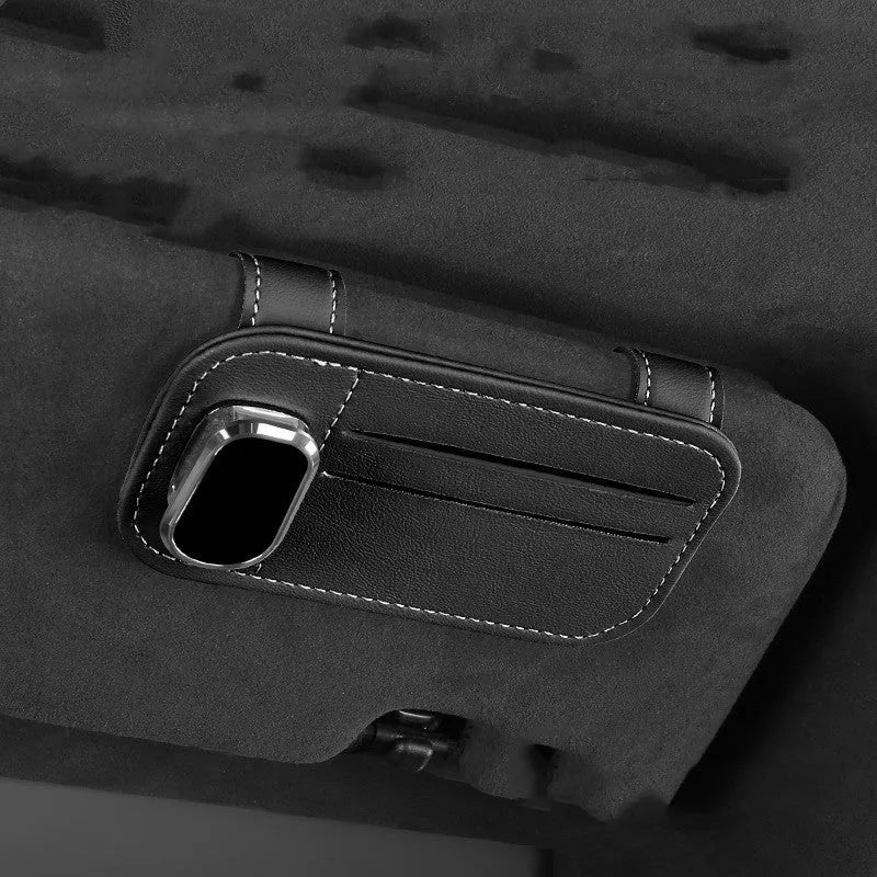 Leather car sun visor card holder with sunglasses clip in snap-on design available in multiple colours.