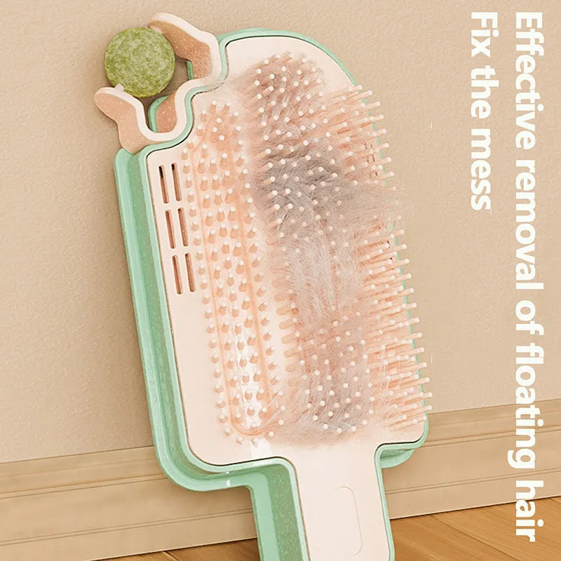 Ice cream shaped cat rubbing toy with interchangeable heads including mint ball and feather attachments