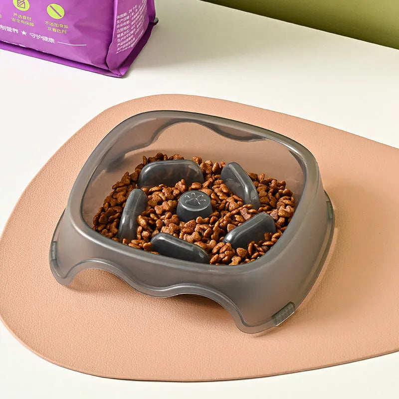Plastic slow feeder dog bowl in blue, grey, green, and orange colour options
