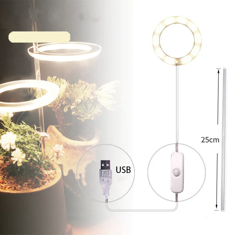 USB-powered LED plant grow light with full spectrum yellow LEDs, acrylic mounting stick, in pink/white colour.