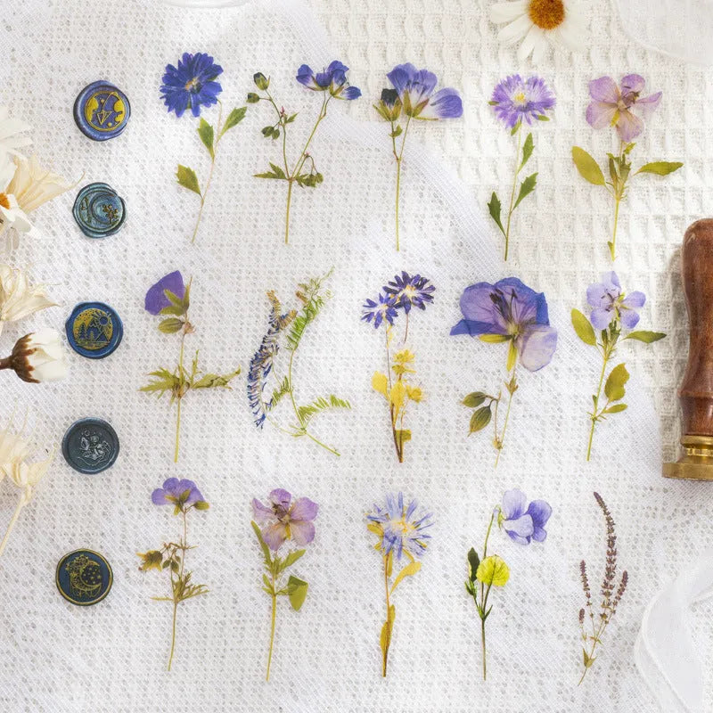 Package of 40 square dried flowers art sticker sheets in eight colour themes on a PET material base.