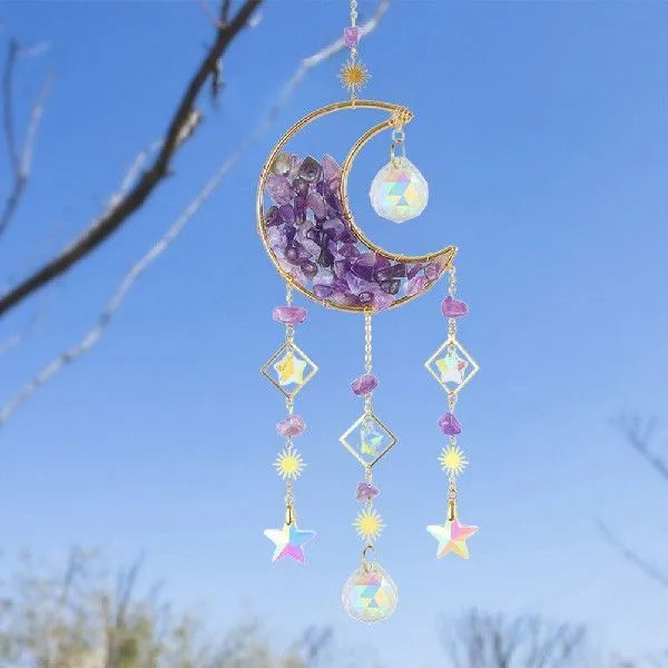 K9 crystal moon pendant on a metal chain for car interior decoration.