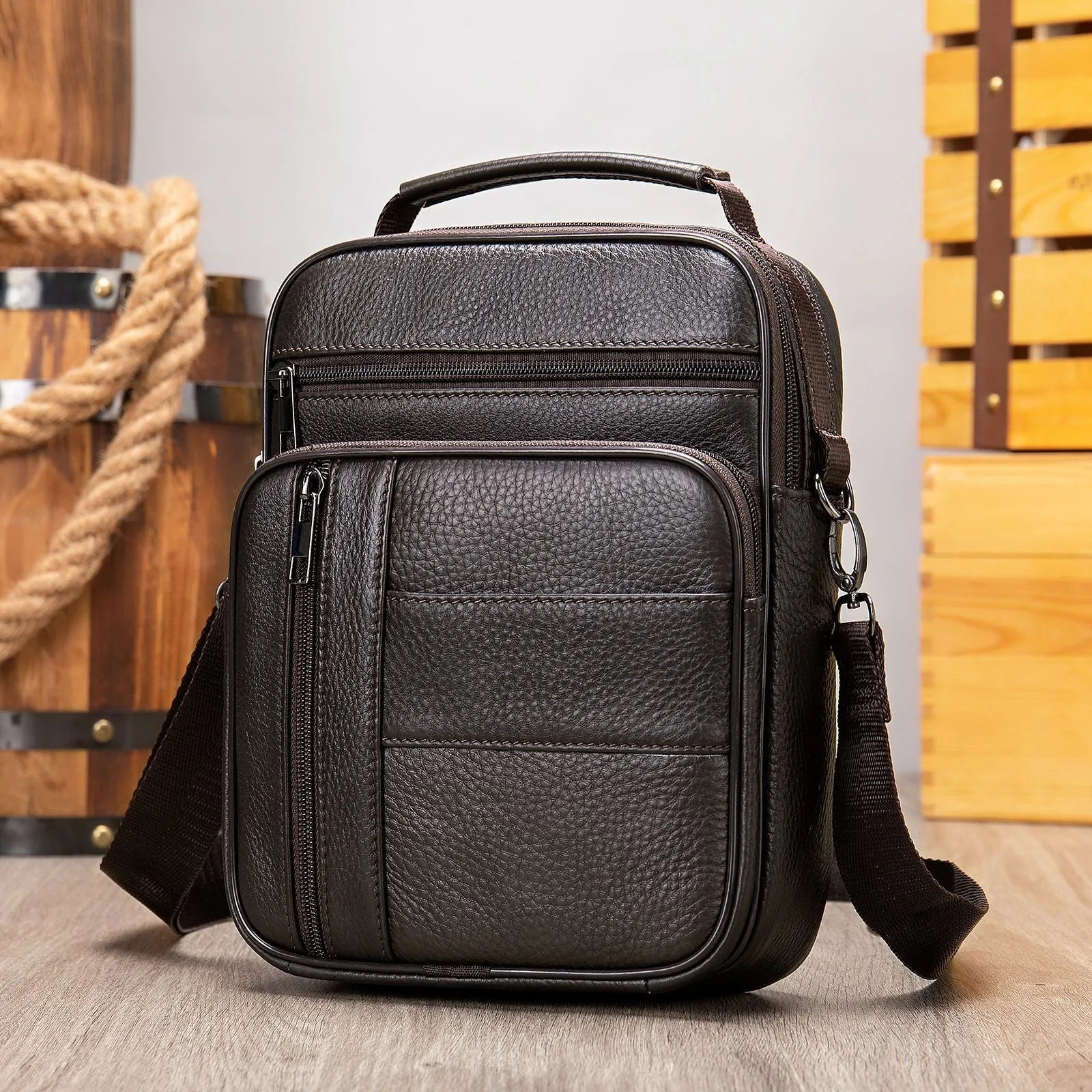 Men's vintage cowhide leather shoulder bag in vertical square design with zipper opening and soft handle
