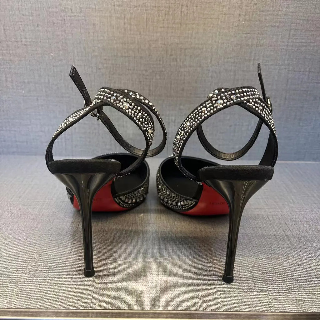 Women's silver and black hollow high heels with red sole and pointed toe design