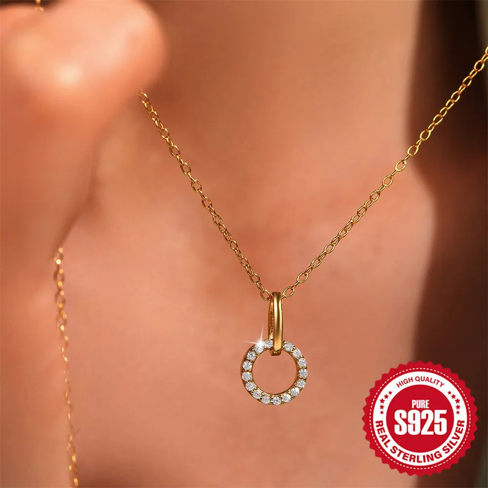 Gold tone adjustable sterling silver clavicle chain with interlocking micro inlaid zircon geometric design