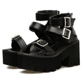 Black women's chunky heel sandals with back zipper, thick sole, buckle detail and round toe in punk Harajuku style.