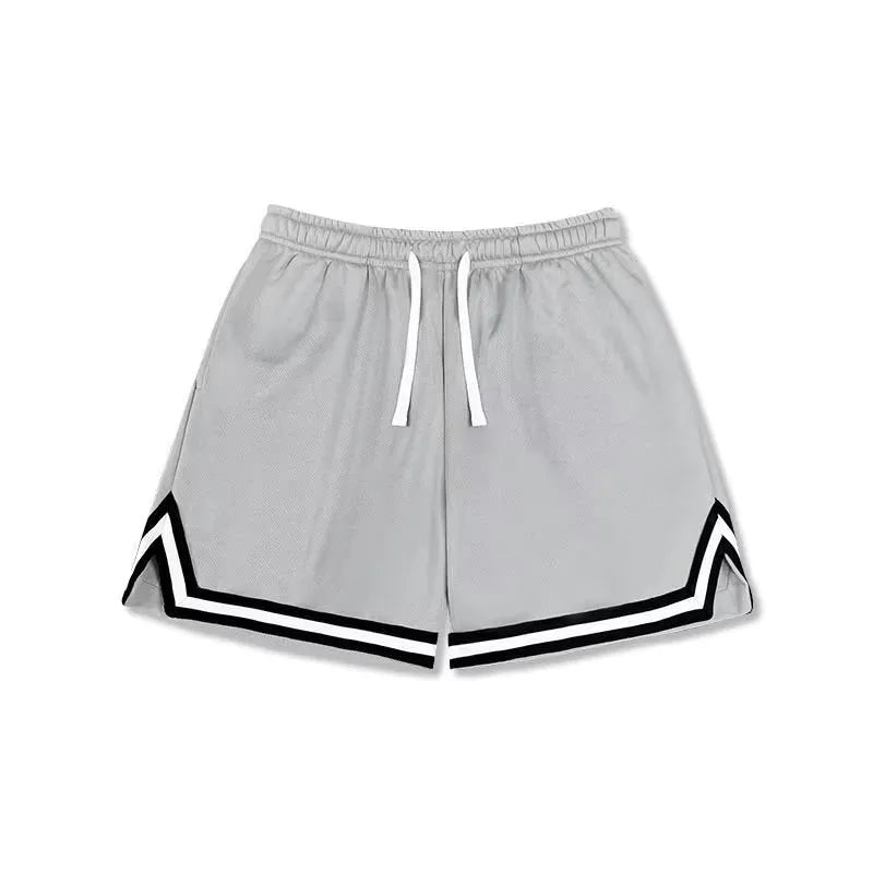 Men's loose-fit polyester sports shorts in various colours with elastic waistband