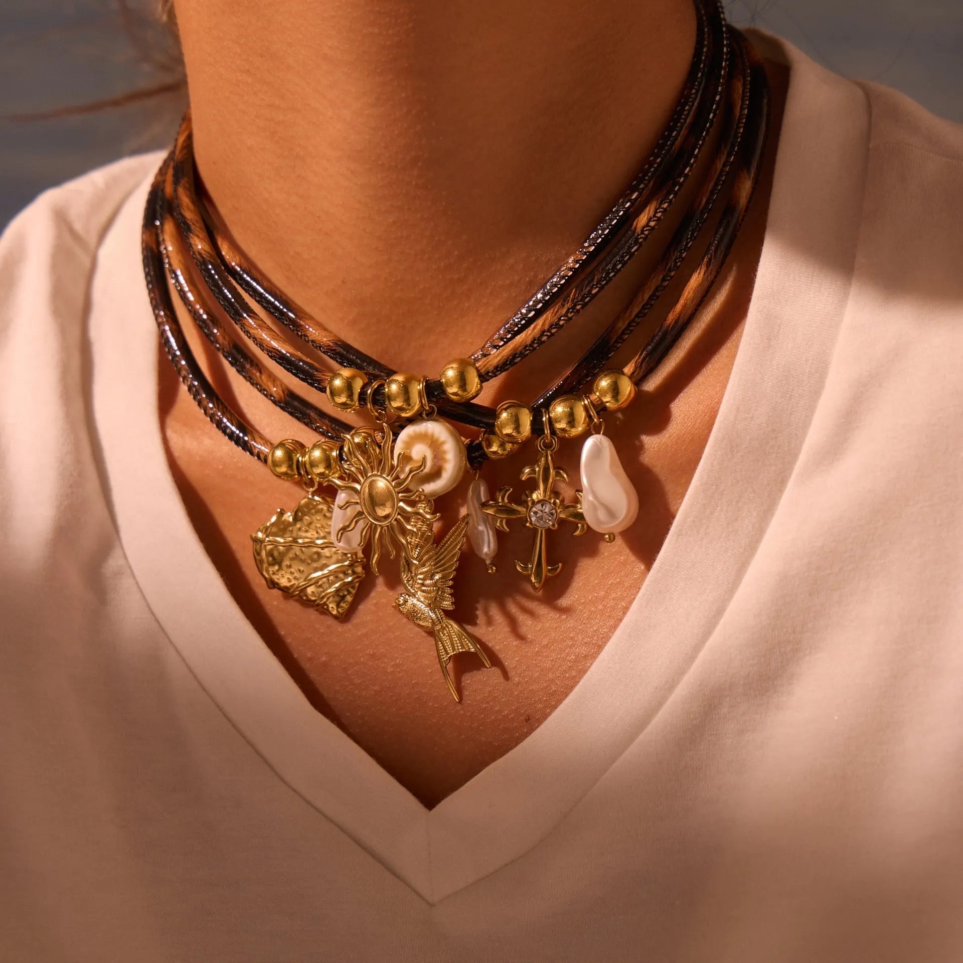 Women's stainless steel necklace with geometric leopard leather pendant on gold chain