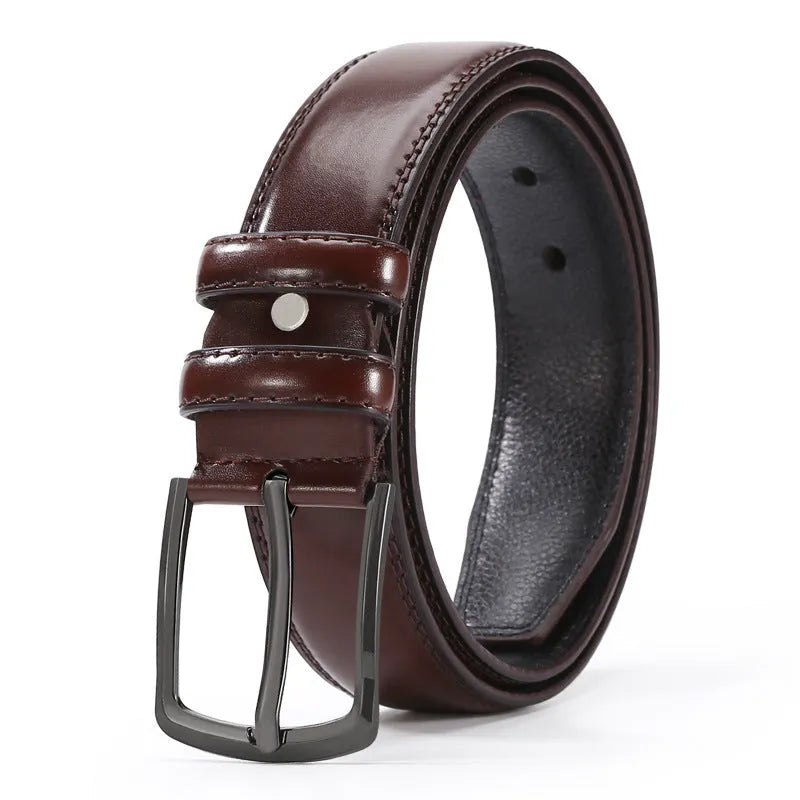 Men's business belt showing laser pattern detail with alloy pin buckle on imitation leather strap
