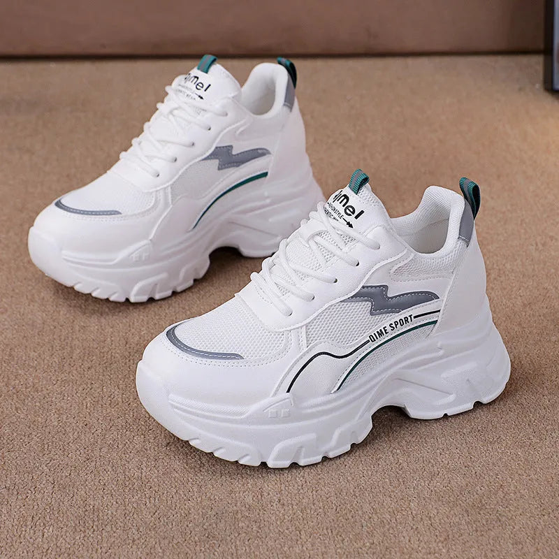 White women's dad shoes with cross shoulder straps, lace-up front, and a breathable mesh upper.