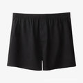 Men's solid colour loose-fit cotton boxer shorts on a white background, showing high waist and leg openings.