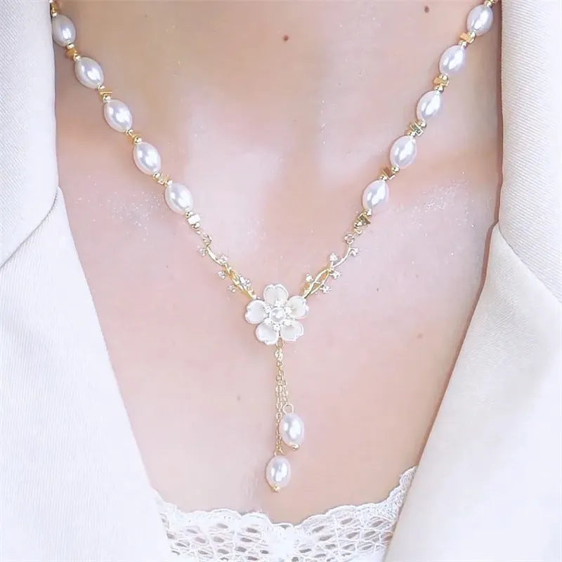 Alloy pearl flower necklace with rose accents on model