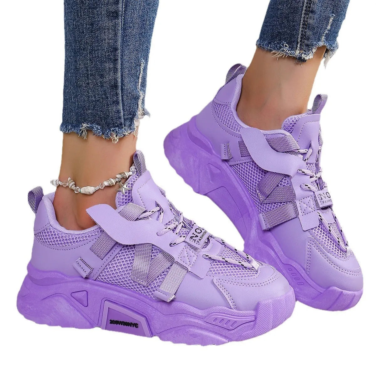 Women's purple platform mesh dad shoes with animal pattern detailing and lace-up front