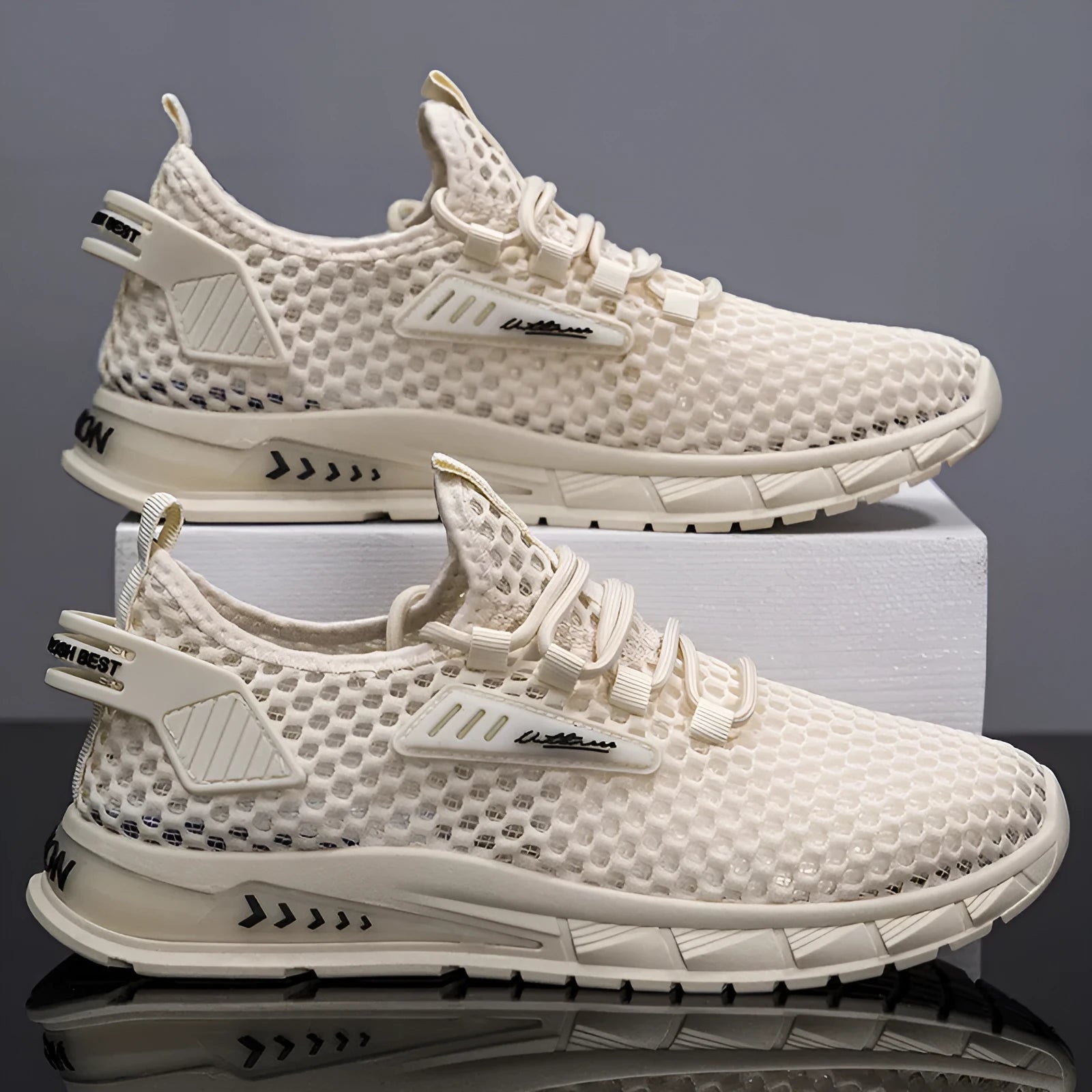Men's beige mesh-lined casual sneakers with synthetic leather upper and white EVA sole.