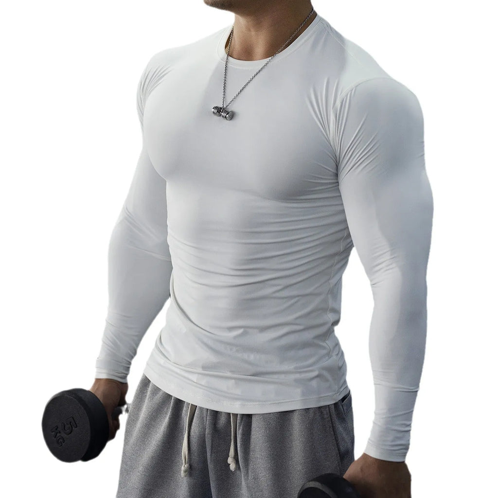 Man wearing black slim-fit long sleeve fitness tights for workout