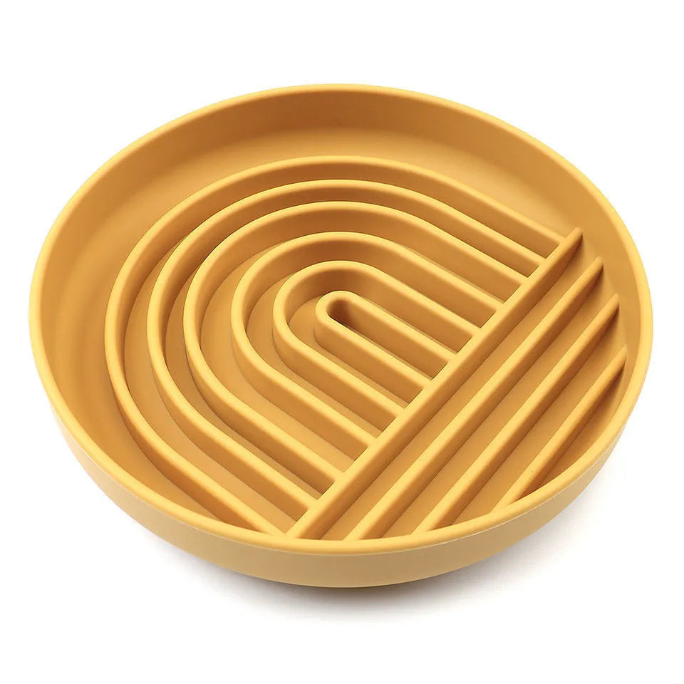 Silicone slow feeder dog bowl with textured ridges, shown in mustard green colour
