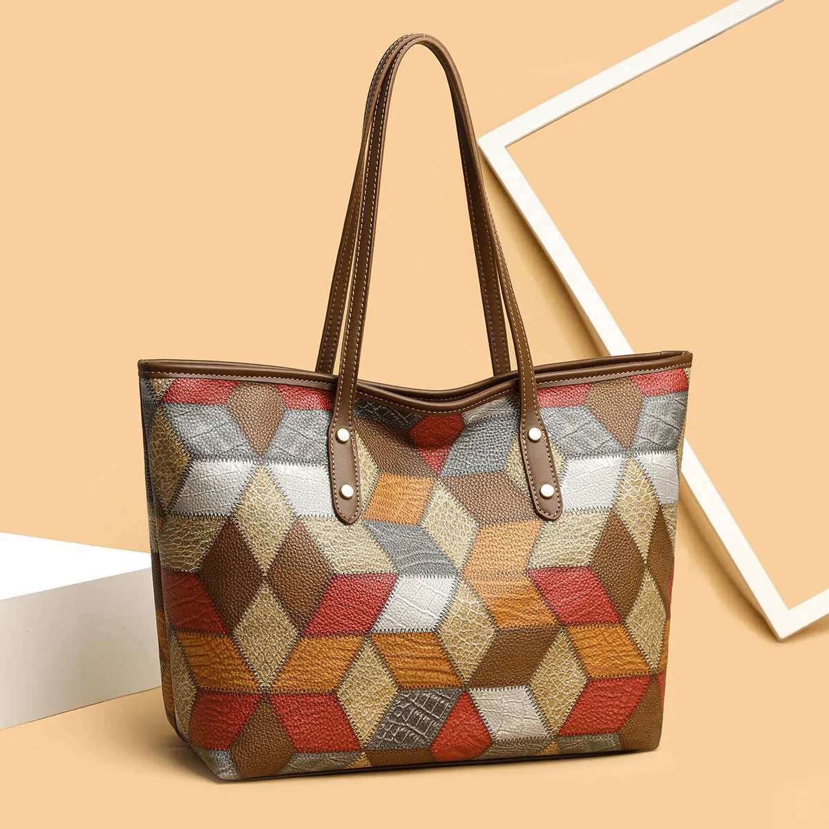 Women's large capacity PVC handbag in blue brown colour with sandwich pocket design for business and leisure use