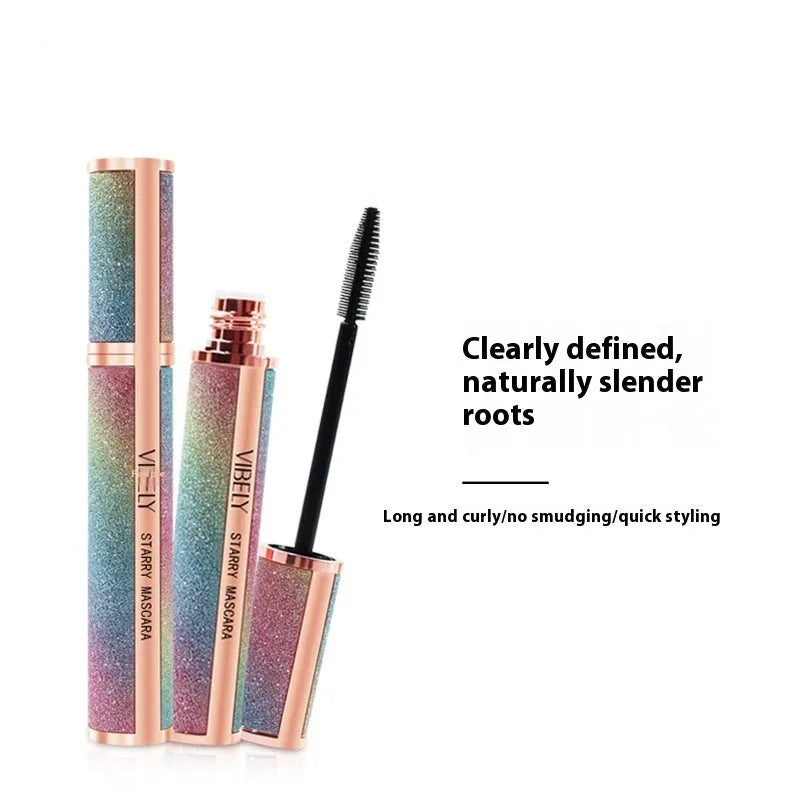 Black waterproof mascara wand for thick, curling lashes with English packaging.